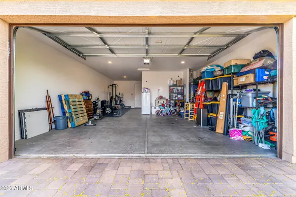 a view of a garage with a lot of stuff