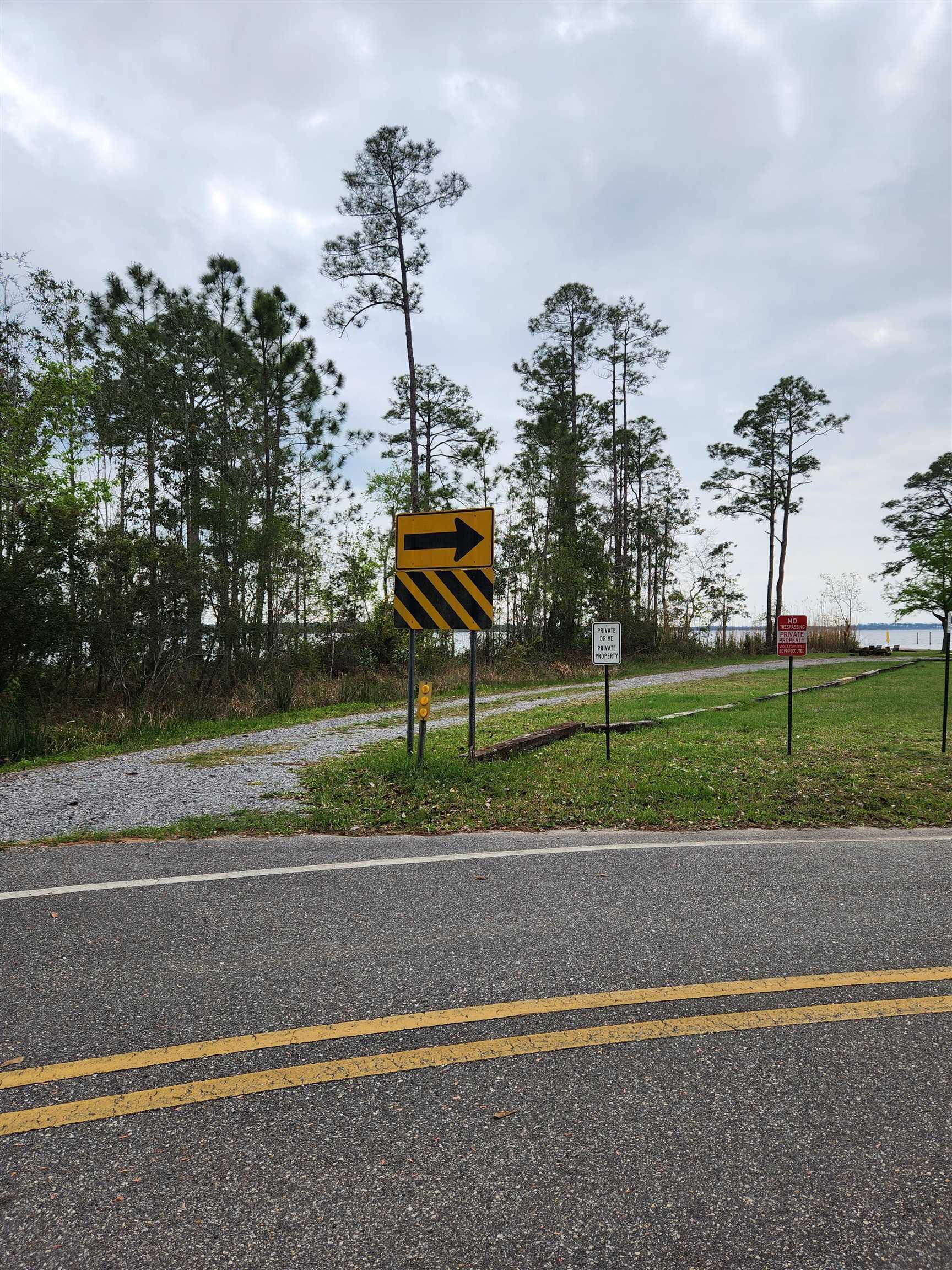 0 7th Street Lillian, AL 36549 - Photo 4 of 6 View of road featuring traffic signs