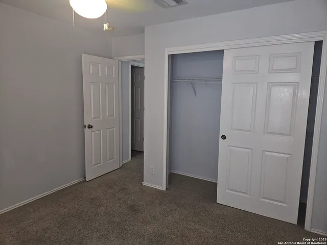 a bathroom with a shower and a bath tub