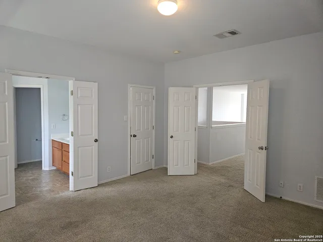 a view of small space with racks on the wall