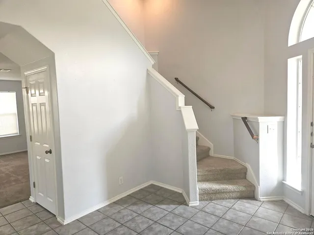a kitchen with a stove a sink and a refrigerator
