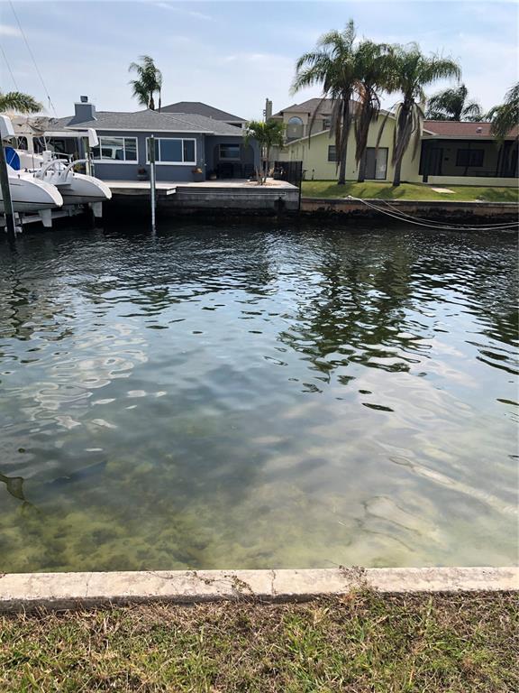 5834 Beverly Drive Hudson, FL 34667 - Photo 5 of 6 a view of a lake with boats