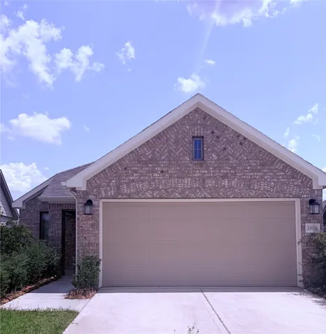a front view of a house with yard