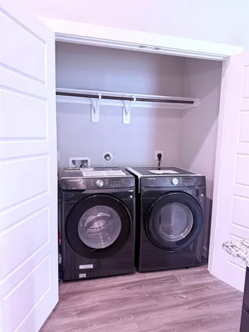 a view of washer and dryer in a utility room