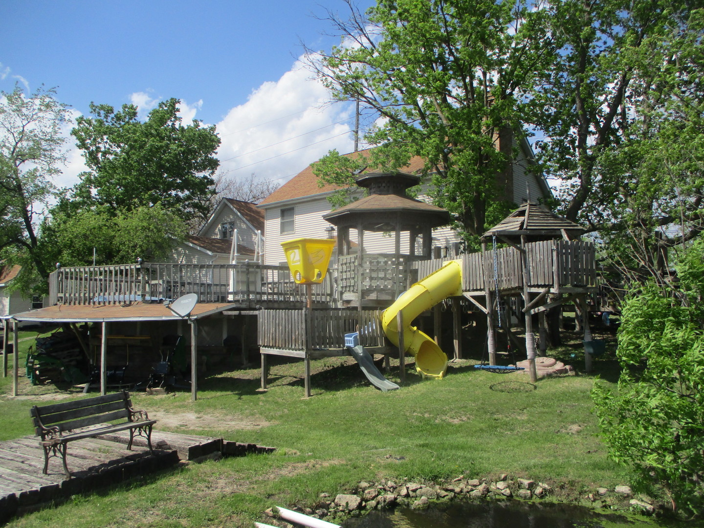 1864 North 2753rd Road Ottawa, IL 61350 - Photo 16 of 31 a view of a house with backyard and a slide