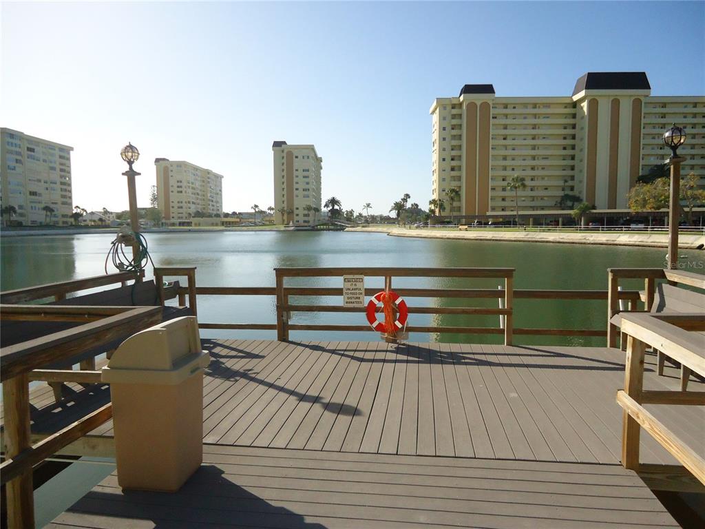 4550 Cove Circle, Unit 405 Madeira Beach, FL 33708 - Photo 14 of 20 a view of outdoor space with seating space