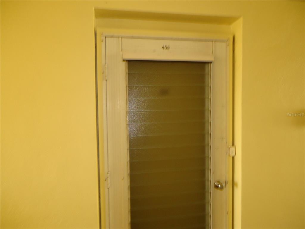 4550 Cove Circle, Unit 405 Madeira Beach, FL 33708 - Photo 2 of 20 a bathroom with a shower
