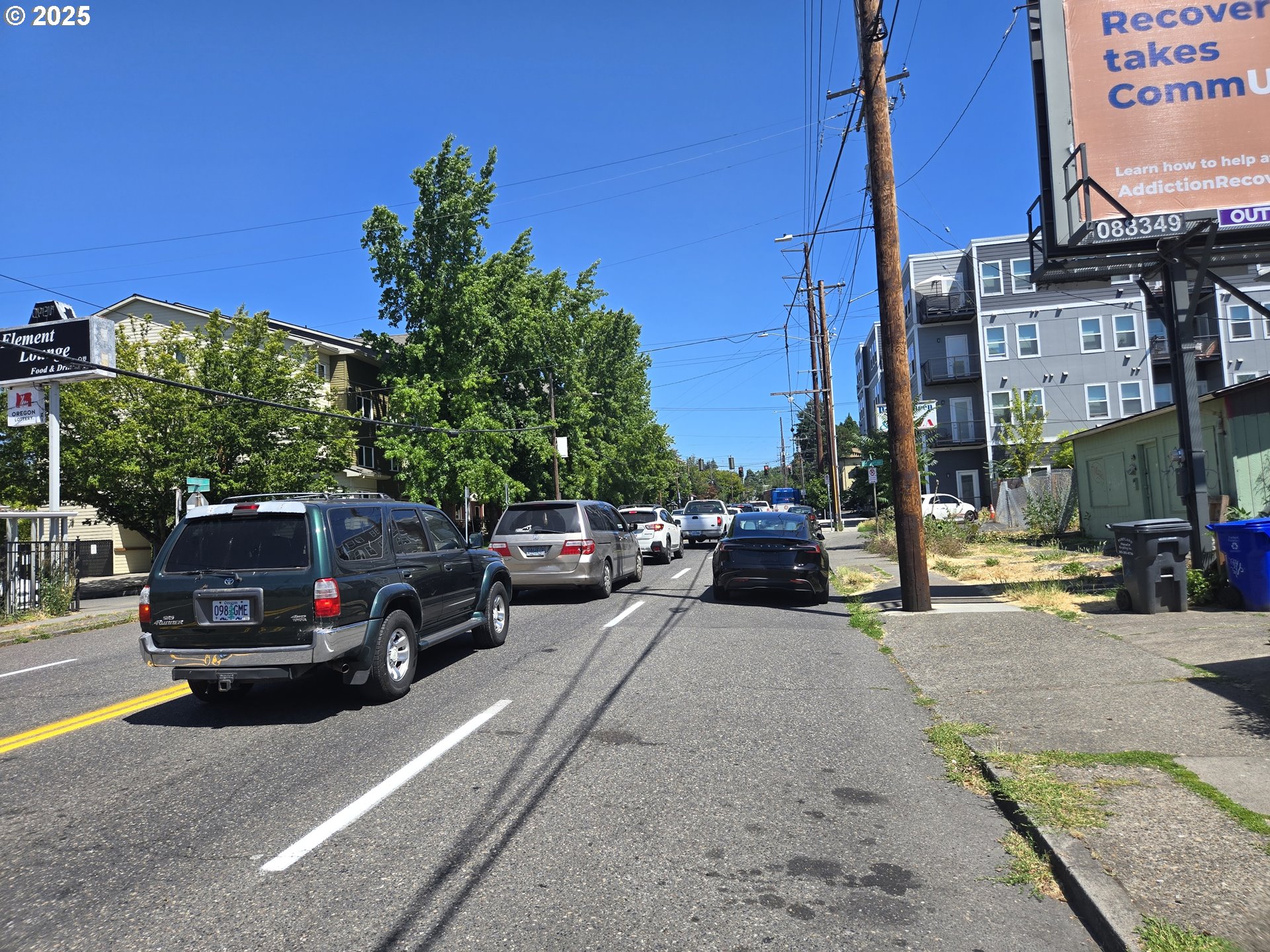 5842 East Burnside Street Portland, OR 97215 - Photo 6 of 7 a car parked on the side of a street