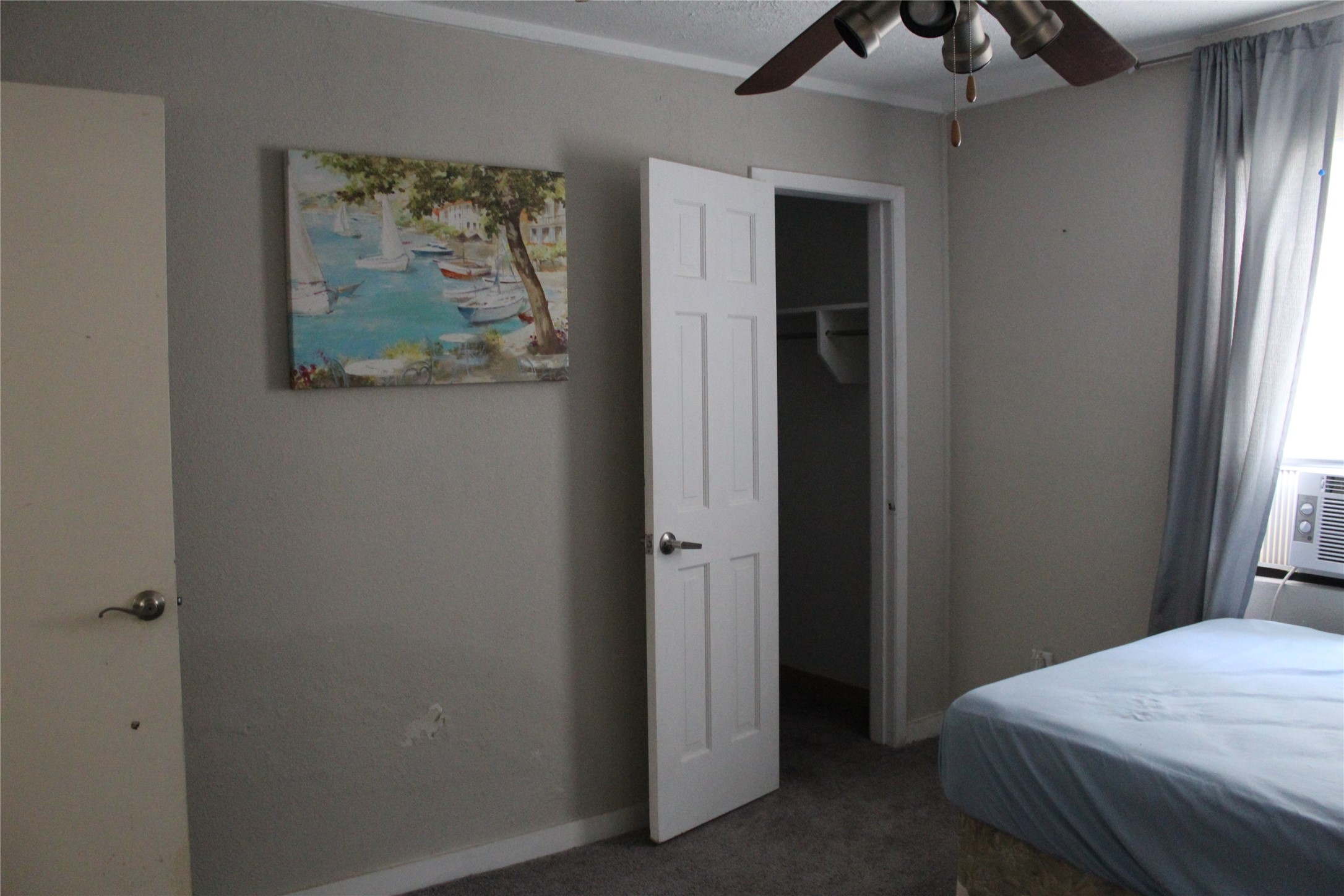 400 Carson Roberson Road Livingston, TX 77351 - Photo 14 of 19 a bedroom with a bed and a window