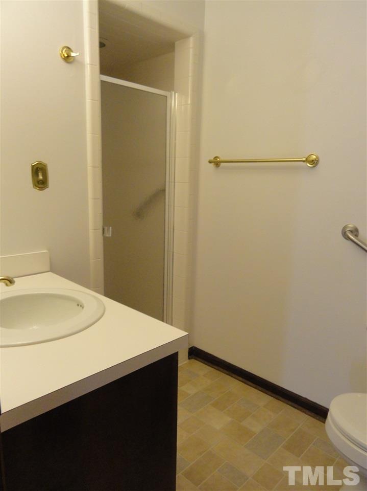 403 Ryan Road Cary, NC 27511 - Photo 15 of 21 Tile shower stall in the master bath.