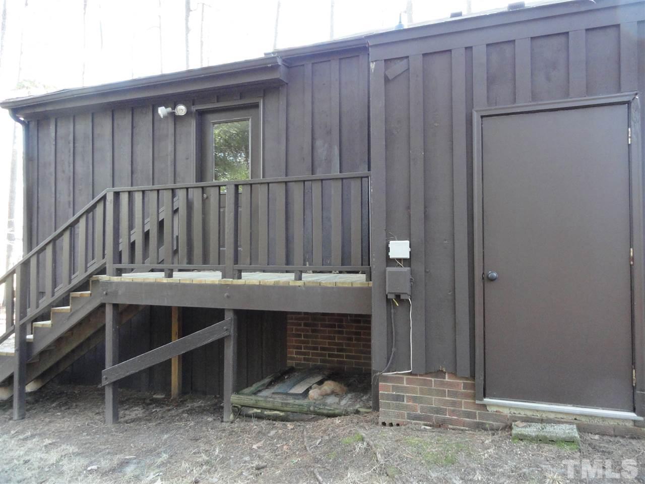 403 Ryan Road Cary, NC 27511 - Photo 20 of 21 The stairs lead to an entrance to the family room. One of the 2 exterior storage closets is pictured here.