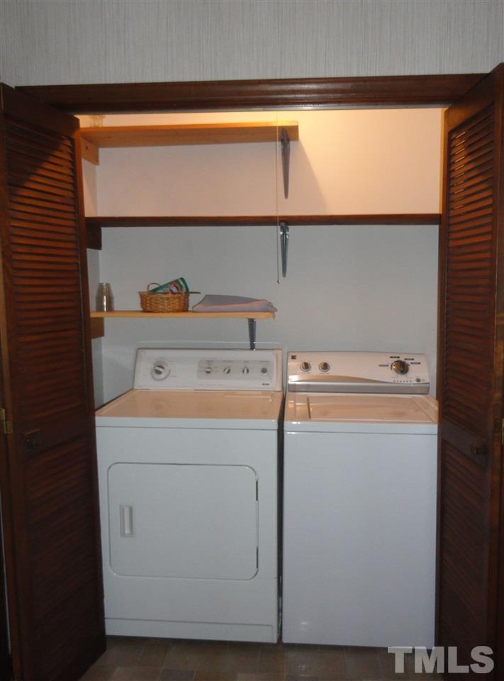 403 Ryan Road Cary, NC 27511 - Photo 9 of 21 The washer & dryer remain with the home.