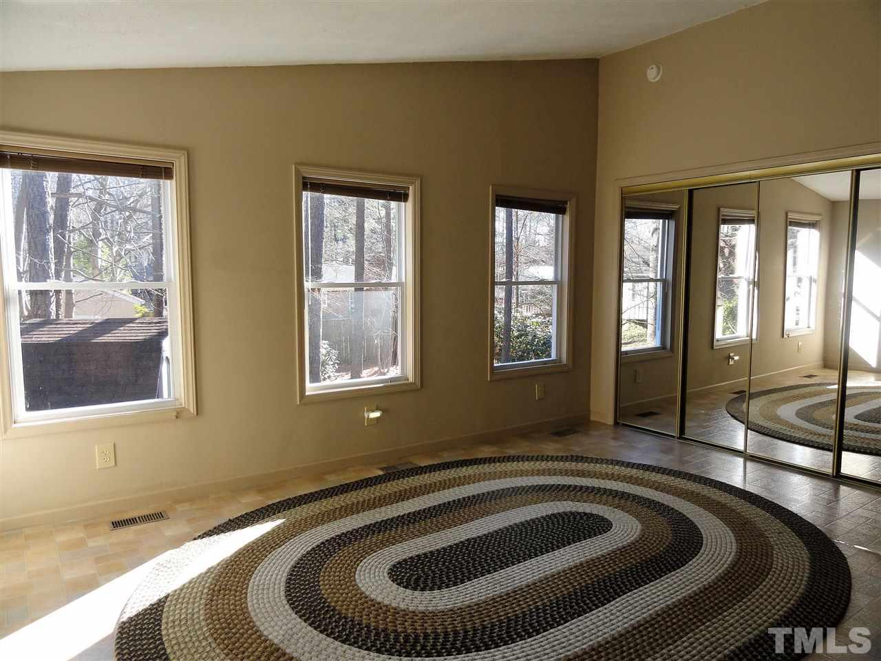 403 Ryan Road Cary, NC 27511 - Photo 10 of 21 The family room was added to the home in 1998. This spacious room has a door to the back yard, skylight, & large closet.