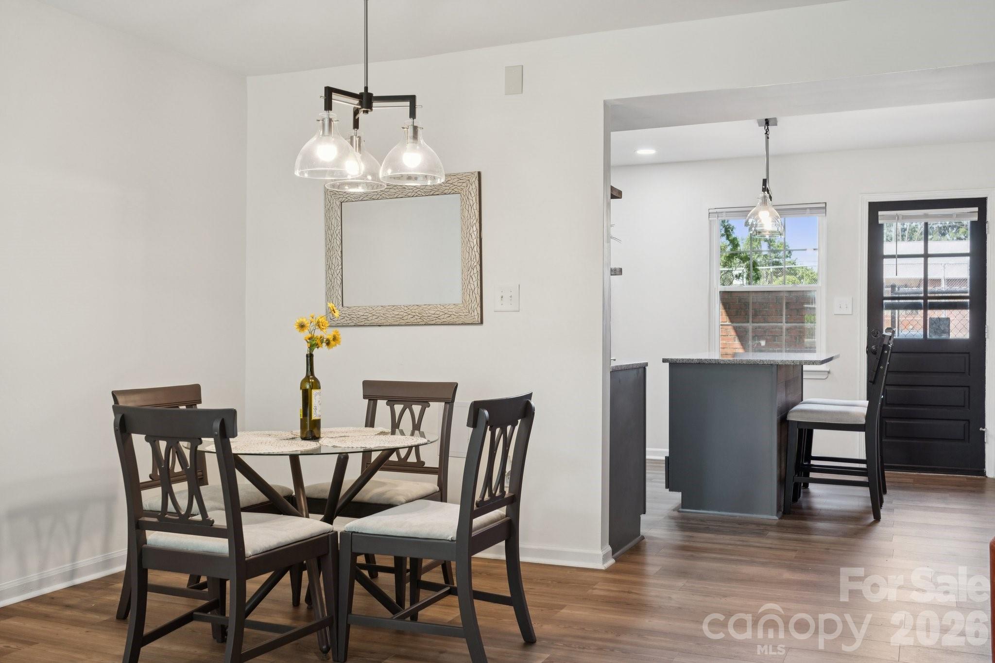 8838 Hunter Ridge Drive Charlotte, NC 28226 - Photo 13 of 27 a dining room with furniture and window