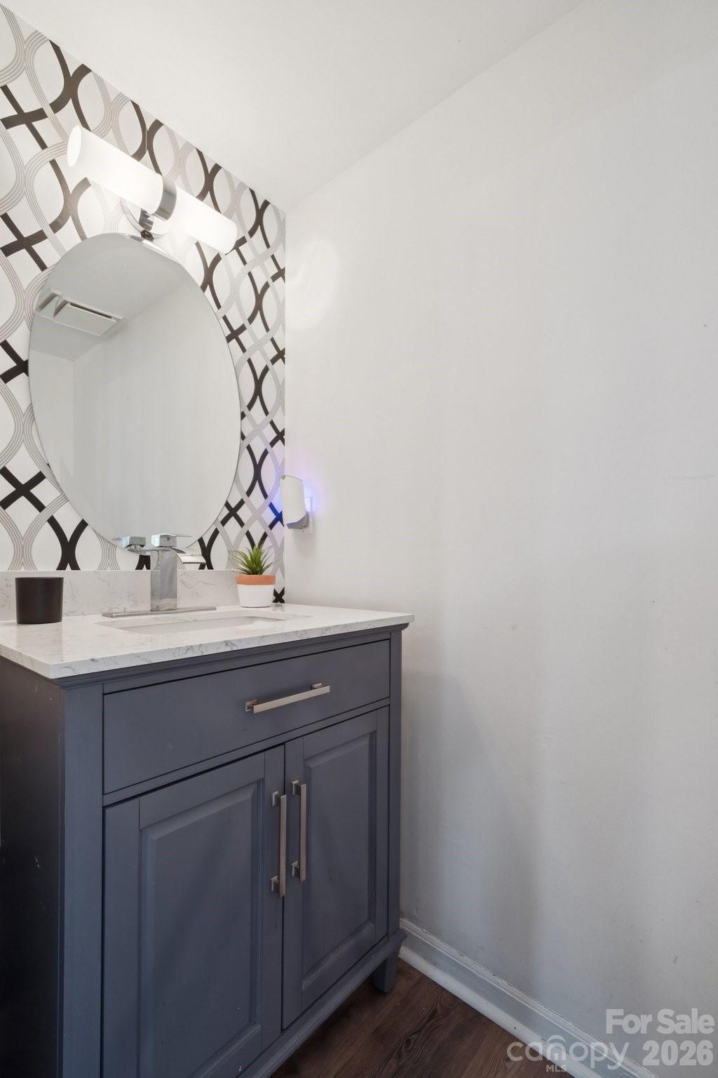 8838 Hunter Ridge Drive Charlotte, NC 28226 - Photo 14 of 27 a bathroom with a sink and vanity