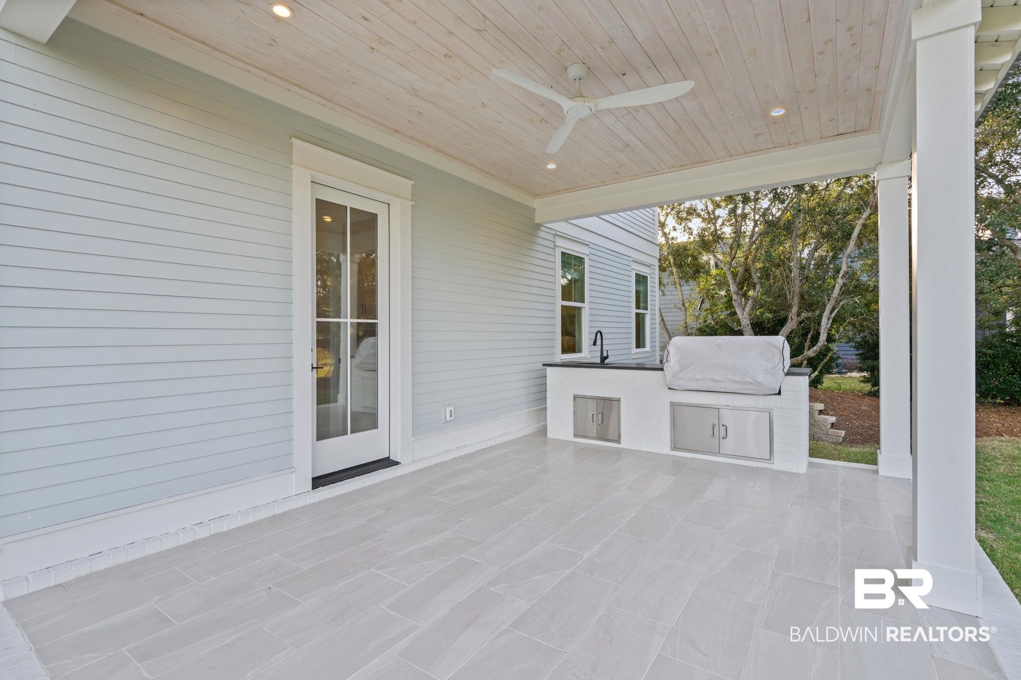 30313 River Road Orange Beach, AL 36561 - Photo 9 of 50 View of patio / terrace featuring a ceiling fan and area for grilling