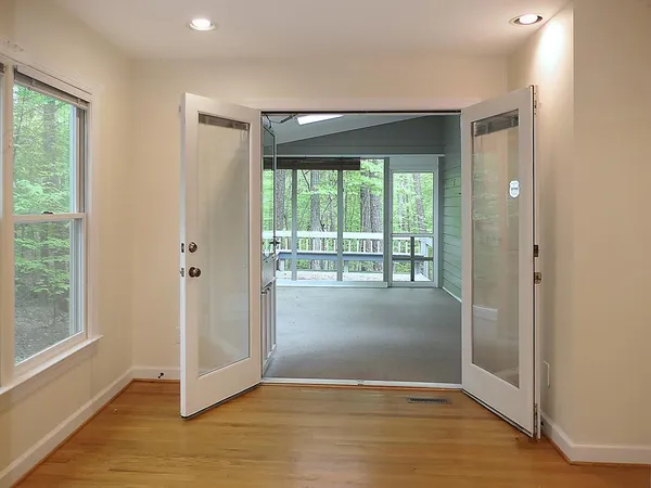 a view of entryway with wooden floor