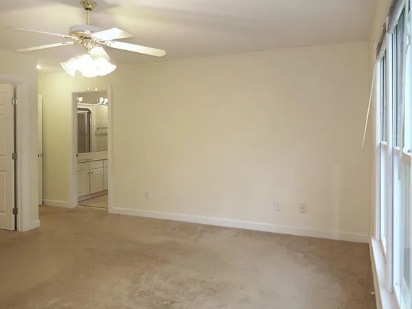 an empty room with a bathroom