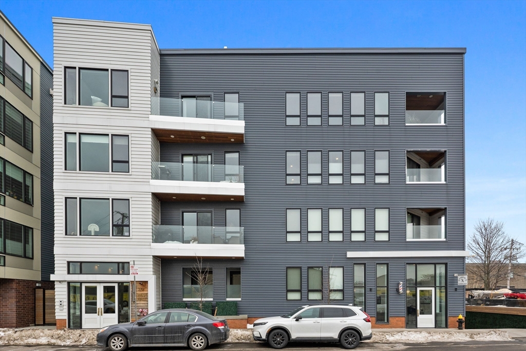 377 West First Street, Unit 5 Boston, MA 02127 - Photo 1 of 27 a front view of a building with a lot of windows