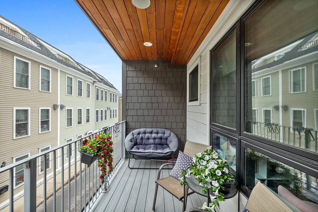 377 West First Street, Unit 5 Boston, MA 02127 - Photo 11 of 27 a balcony view with a seating space