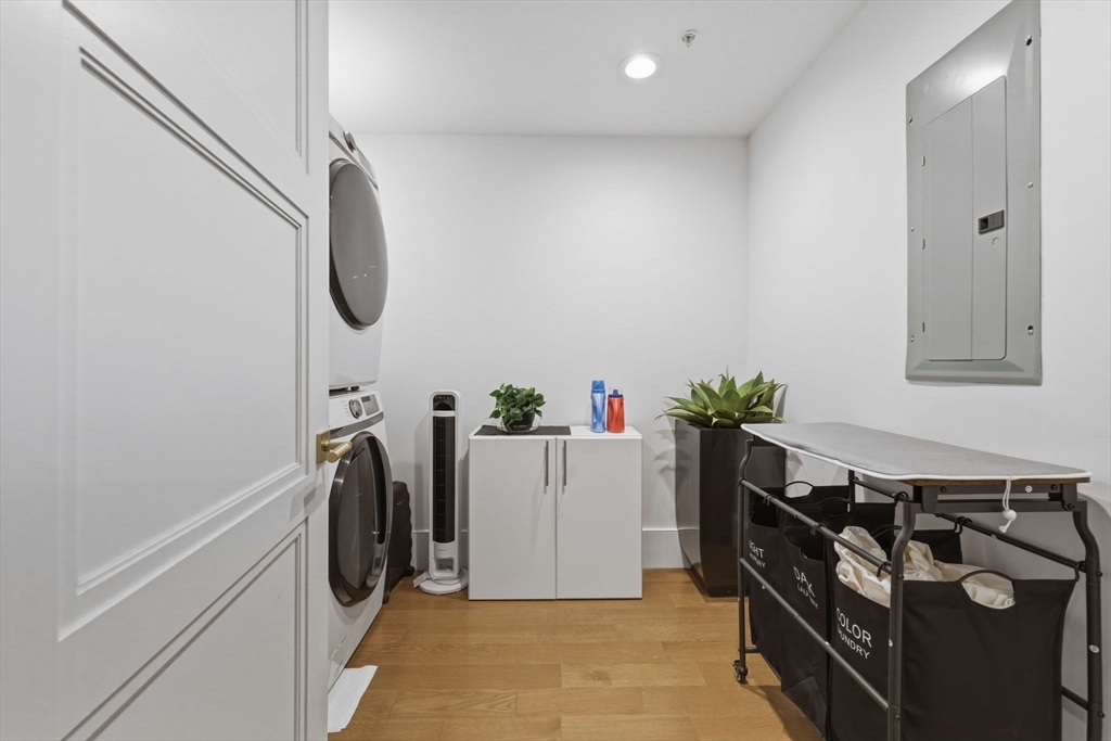 377 West First Street, Unit 5 Boston, MA 02127 - Photo 21 of 27 a view of a storage & utility room with a washer dryer