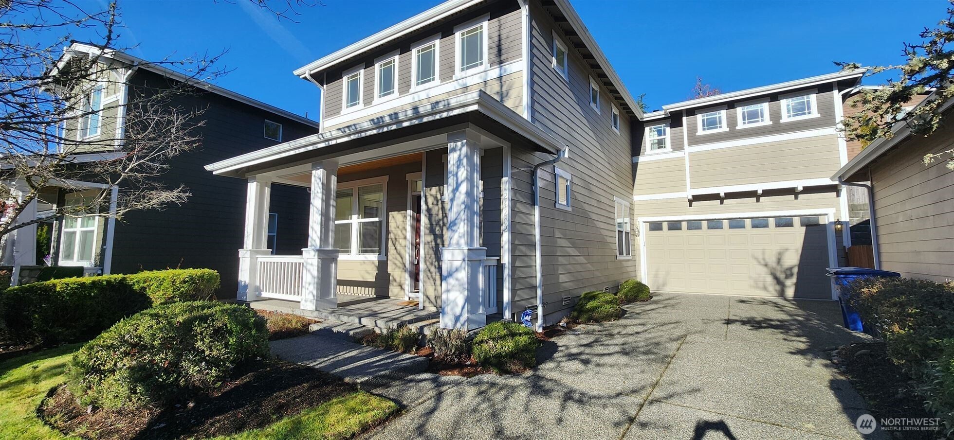 24202 Southeast 21st Street Sammamish, WA 98075 - Photo 4 of 26 a front view of a house with garden