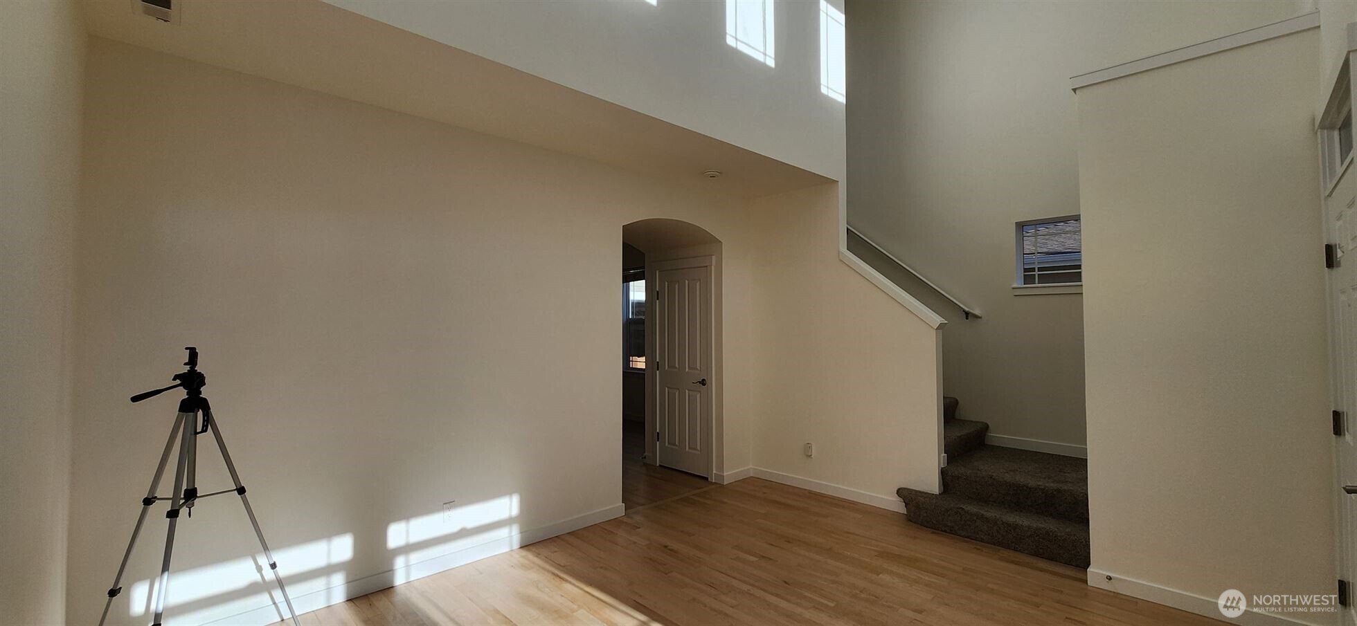 24202 Southeast 21st Street Sammamish, WA 98075 - Photo 6 of 26 a view of a hallway with wooden floor and entryway