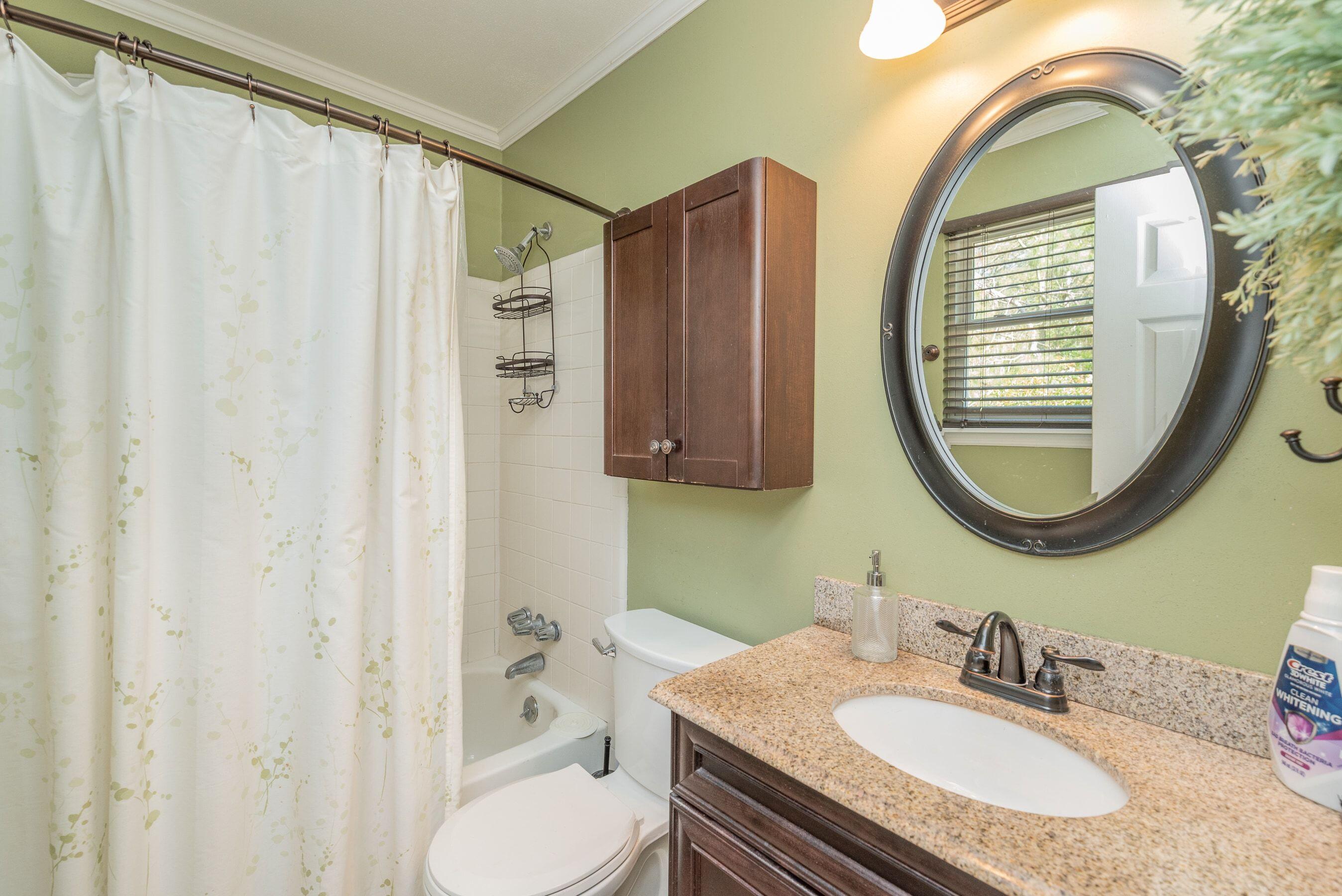 1117 Ridgemont Drive Aiken, SC 29803 - Photo 16 of 49 a bathroom with a sink a toilet and a mirror