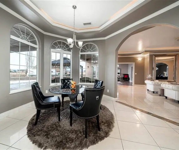 a living room with fireplace furniture and a flat screen tv