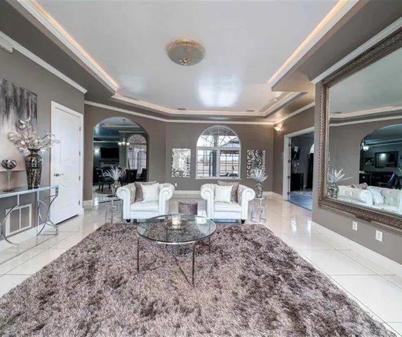 a view of a livingroom with furniture and window