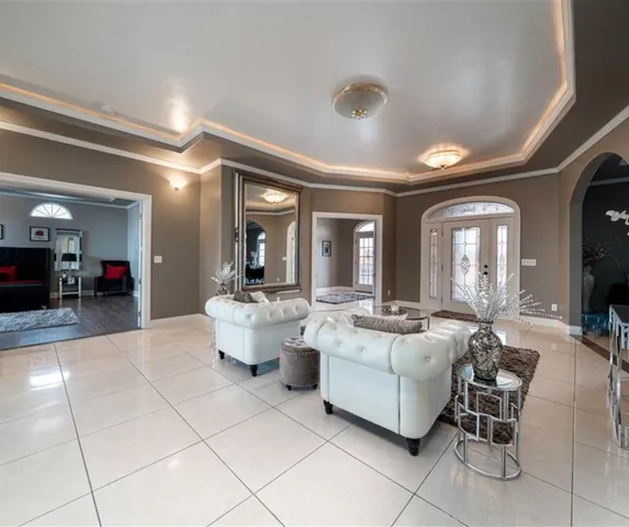 a kitchen with stainless steel appliances granite countertop a stove a sink a microwave and a refrigerator