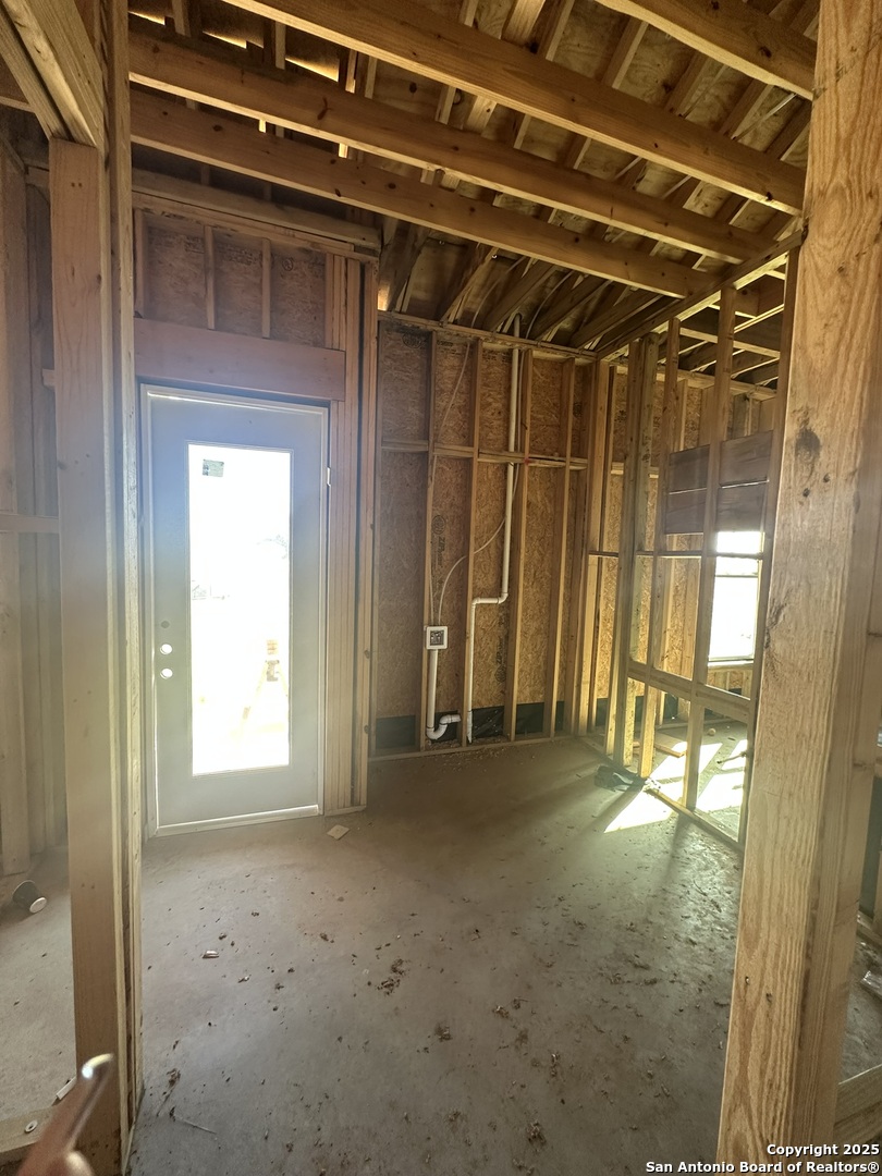 241 County Road 154 Pleasanton, TX 78064 - Photo 17 of 20 a view of a room with a wooden door