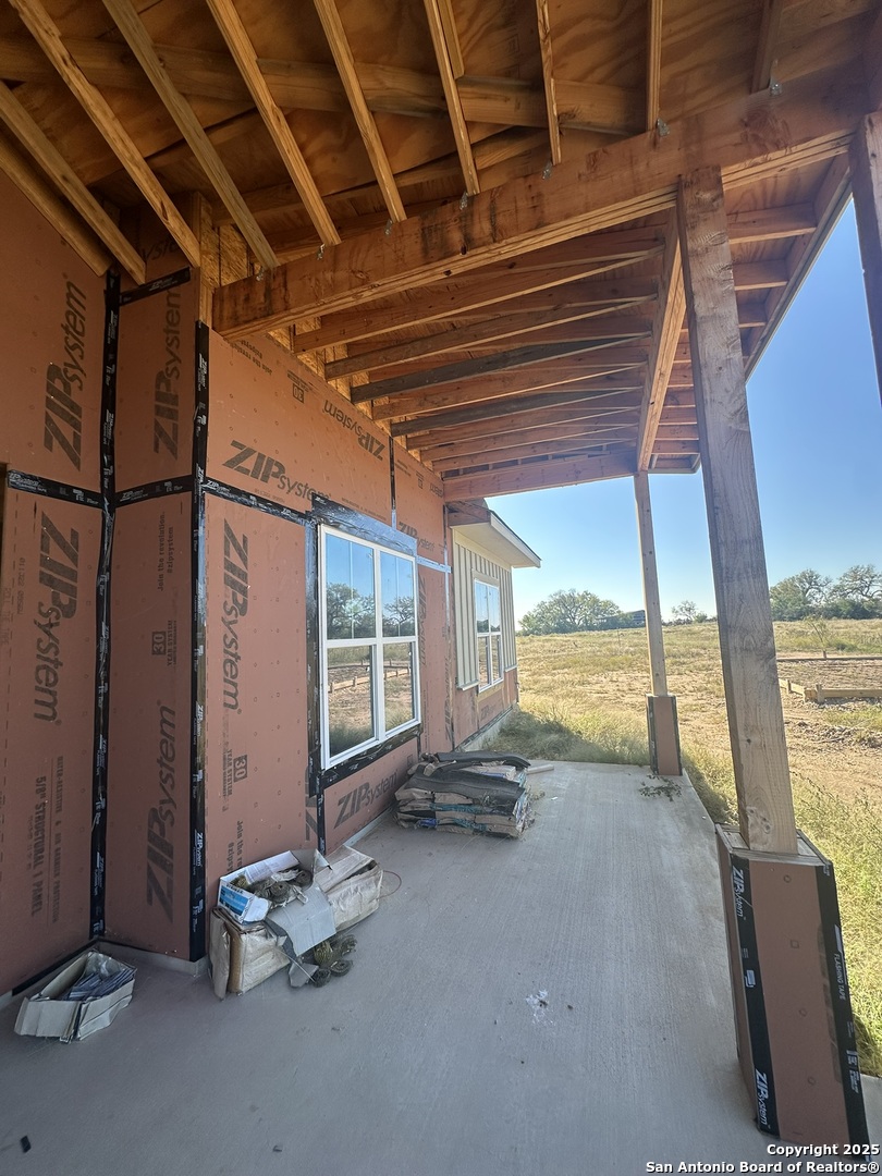 241 County Road 154 Pleasanton, TX 78064 - Photo 6 of 20 a view of a room with gym equipment