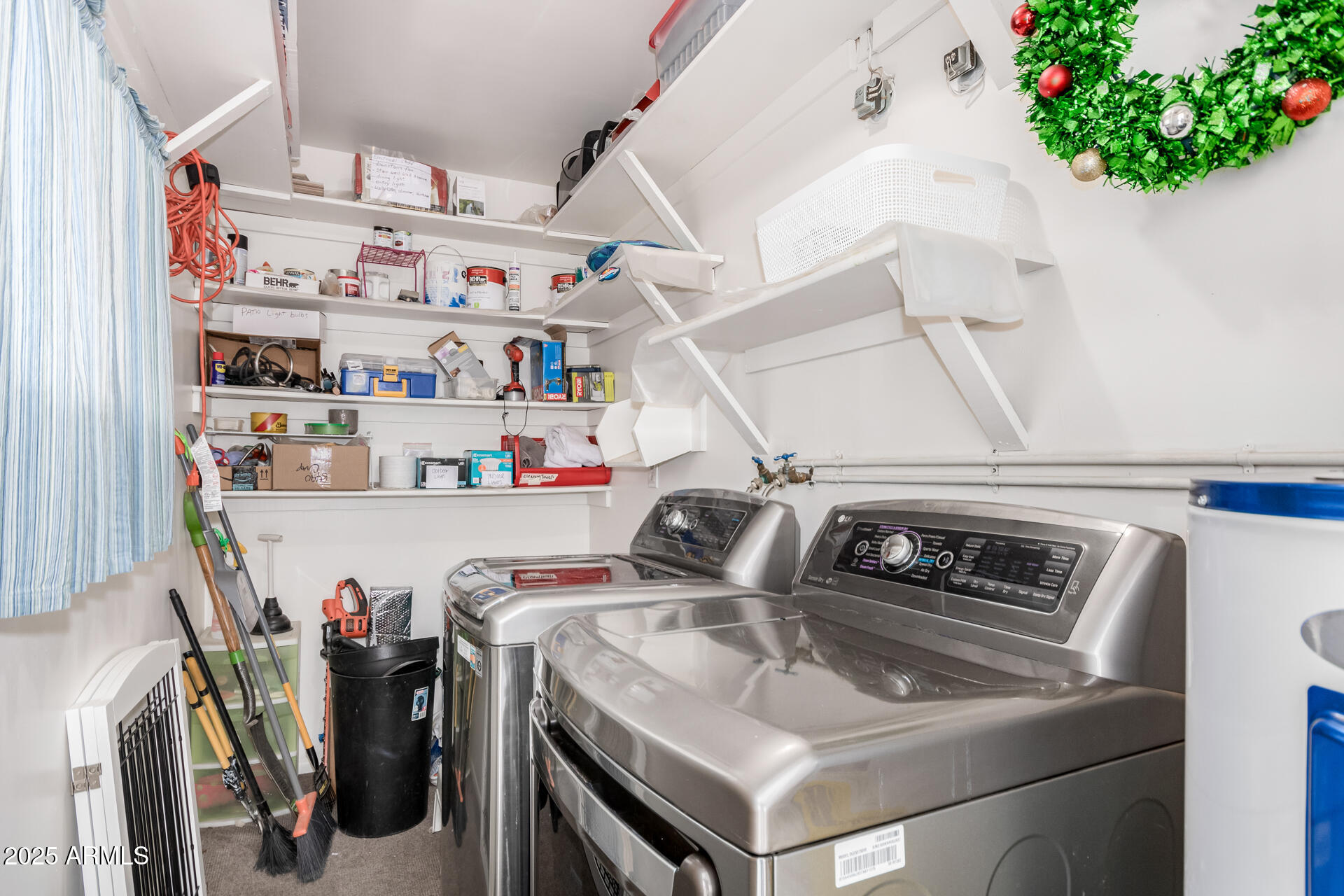 8490 East Chaparral Road Scottsdale, AZ 85250 - Photo 23 of 27 a utility room with dryer and washer