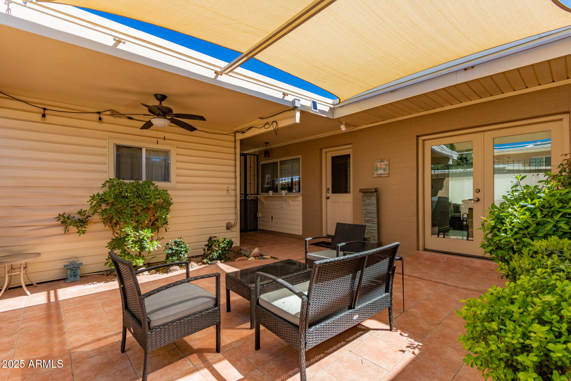 8490 East Chaparral Road Scottsdale, AZ 85250 - Photo 25 of 27 a building outdoor space with patio furniture