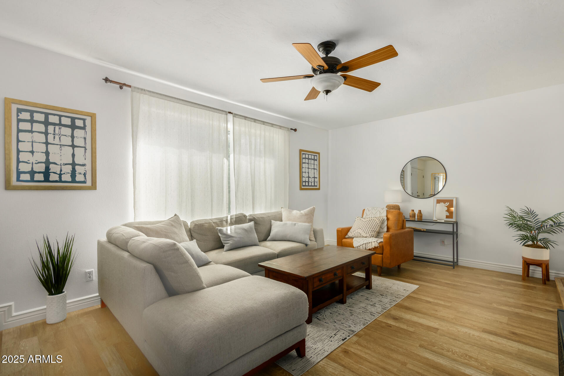 8490 East Chaparral Road Scottsdale, AZ 85250 - Photo 5 of 27 a living room with furniture