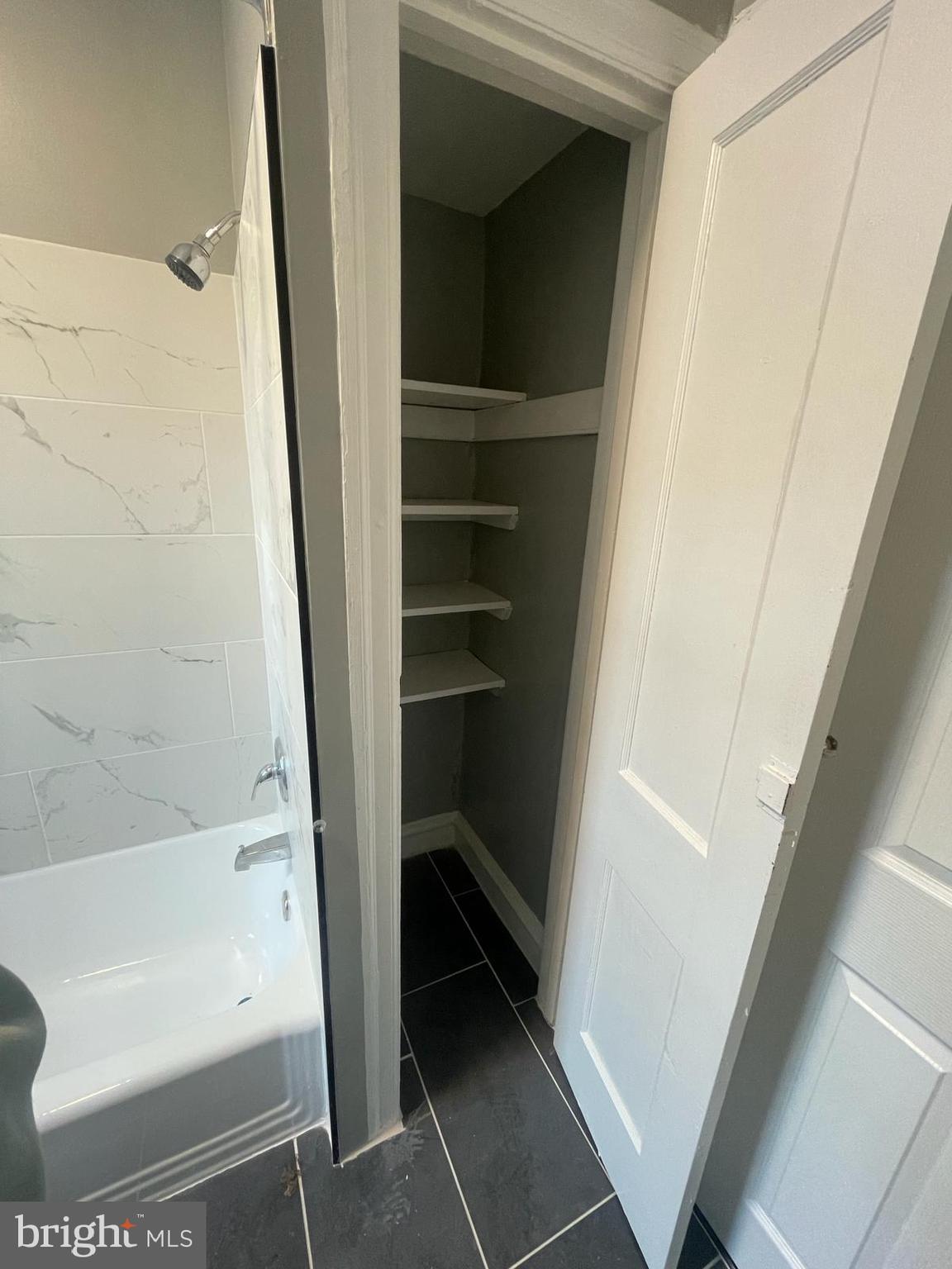 5750-52 Rising Sun Avenue, Unit 2A Philadelphia, PA 19120 - Photo 11 of 22 a bathroom with a bathtub
