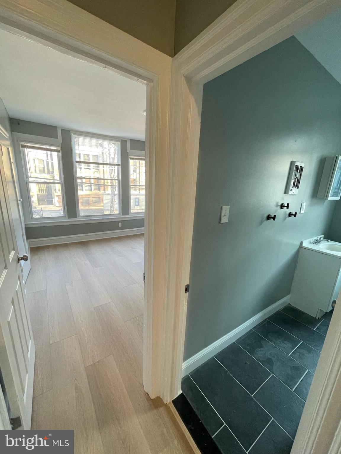 5750-52 Rising Sun Avenue, Unit 2A Philadelphia, PA 19120 - Photo 3 of 22 a bathroom with a sink toilet and shower