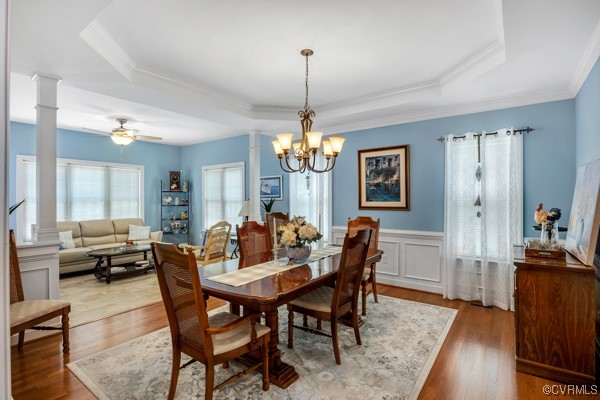 601 Carldan Road Richmond, VA 23227 - Photo 11 of 43 Dining area featuring decorative columns, a raised