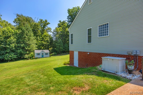 601 Carldan Road Richmond, VA 23227 - Photo 41 of 43 View of spacious yard, walk in crawlspace / storag