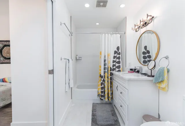 a view of bathroom with dual sinks
