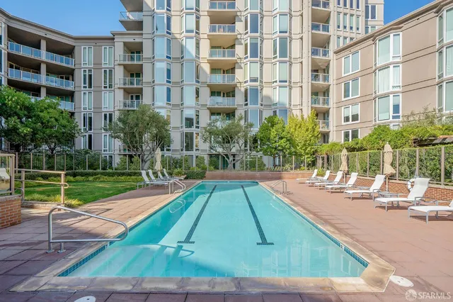 a view of pool with outdoor seating