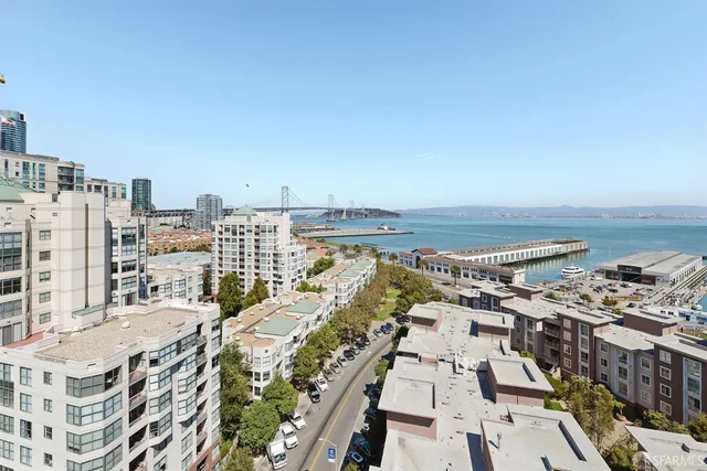 a view of a city with tall buildings