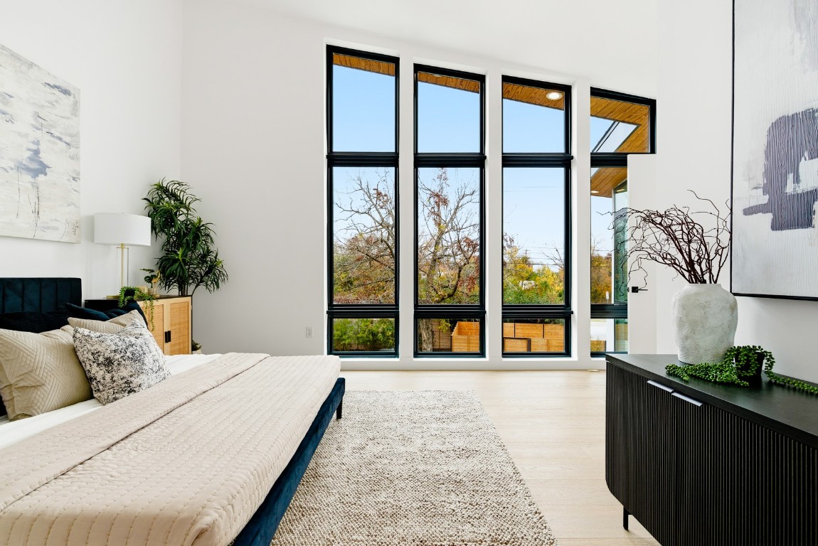 4613 Bolm Road Austin, TX 78702 - Photo 29 of 40 Bedroom with light wood-style floors