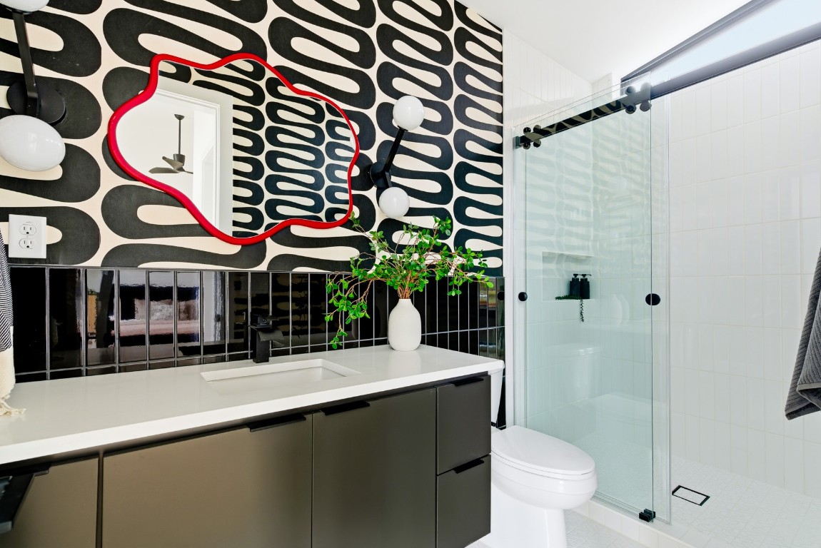 4613 Bolm Road Austin, TX 78702 - Photo 31 of 40 Bathroom with vanity and a stall shower