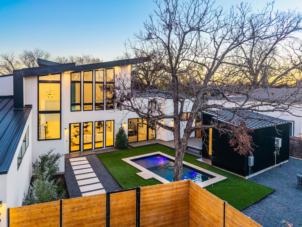 4613 Bolm Road Austin, TX 78702 - Photo 5 of 40 Rear view of house featuring a patio, stucco siding, and a fenced backyard