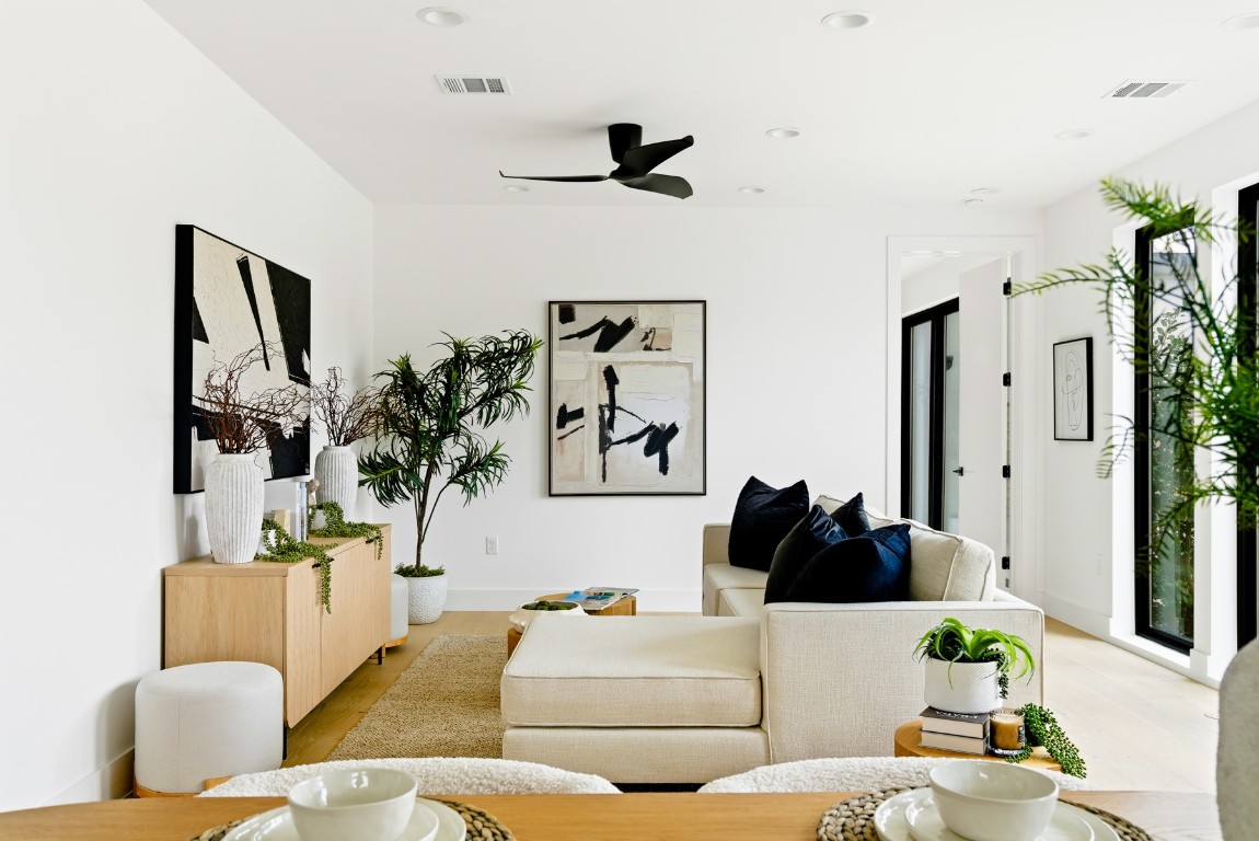 4613 Bolm Road Austin, TX 78702 - Photo 7 of 40 Living room featuring wood finished floors, recessed lighting, and ceiling fan