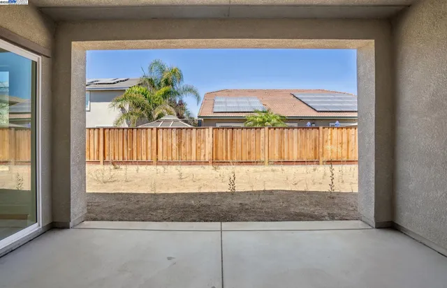 a view of a door and a window