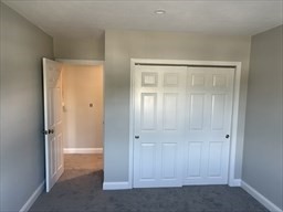 445 Pleasant Street, Unit 32 Weymouth, MA 02190 - Photo 5 of 7 a view of an empty room