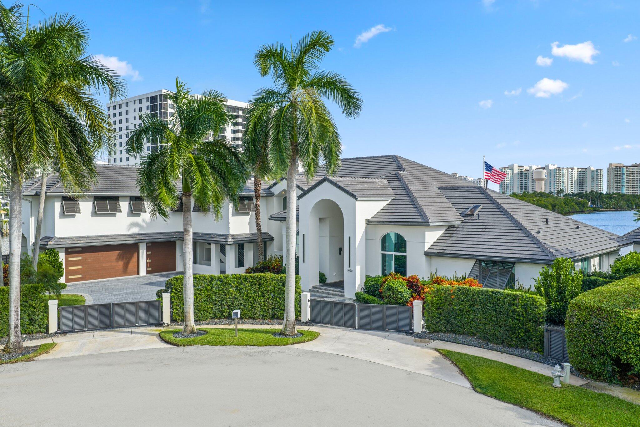 7400 Northeast Orchid Bay Drive Boca Raton, FL 33487 - Photo 5 of 62 Front Exterior View